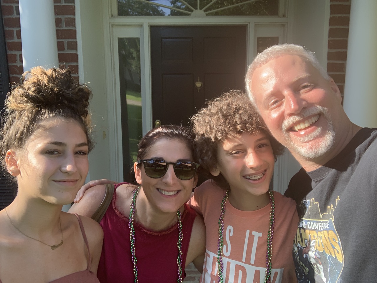 Us posing in front of Randi and Cameron's House