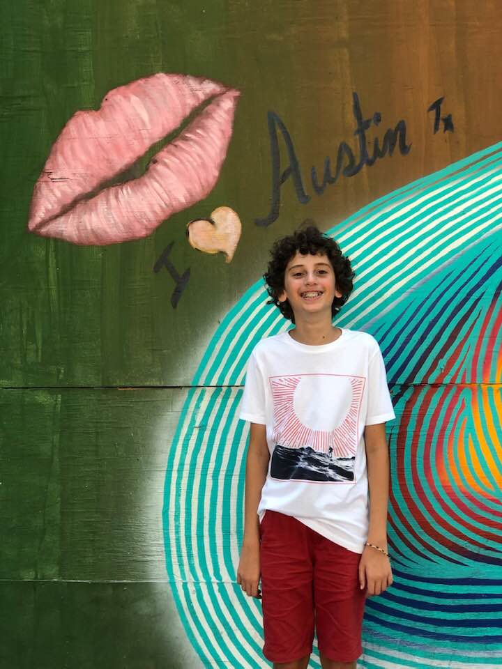 Jules by the Austin mural, downtown.