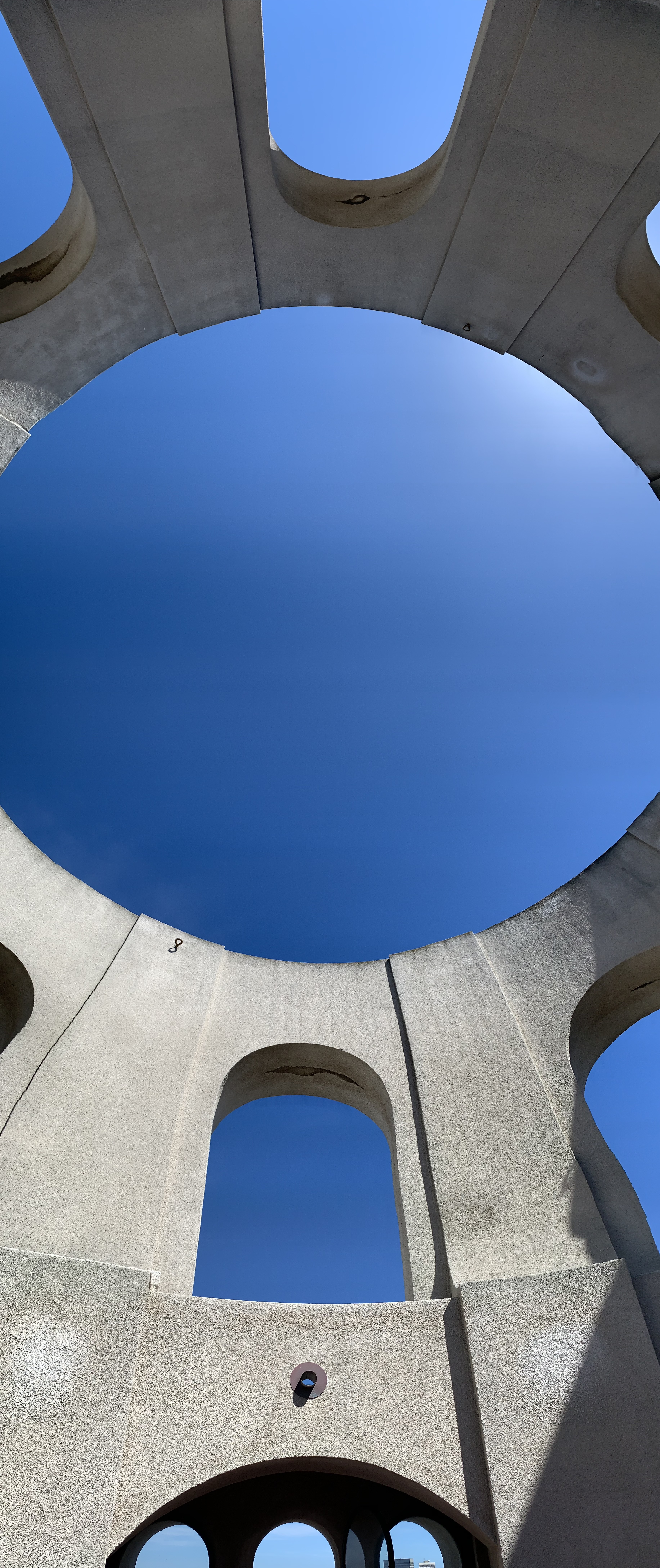 Looking out the open top of the Coit Tower observation deck.