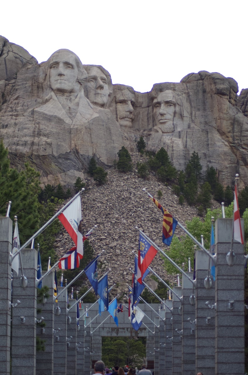 State flags line the way to the monument.