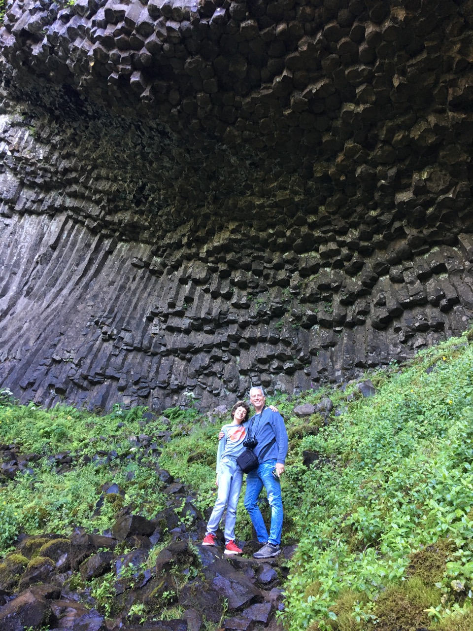 Me and Julian under the basalt cliff behind Latourell Falls.