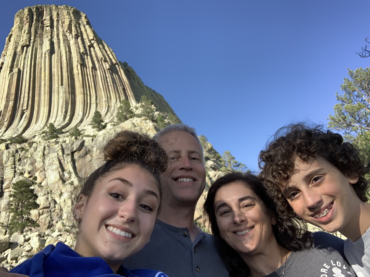 Family in front of Devil's Tower.