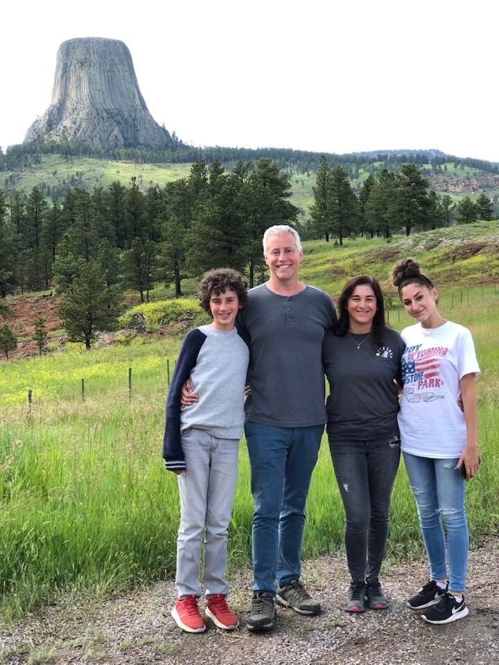 Family at a lookout point near Devil's Tower, Wyoming.