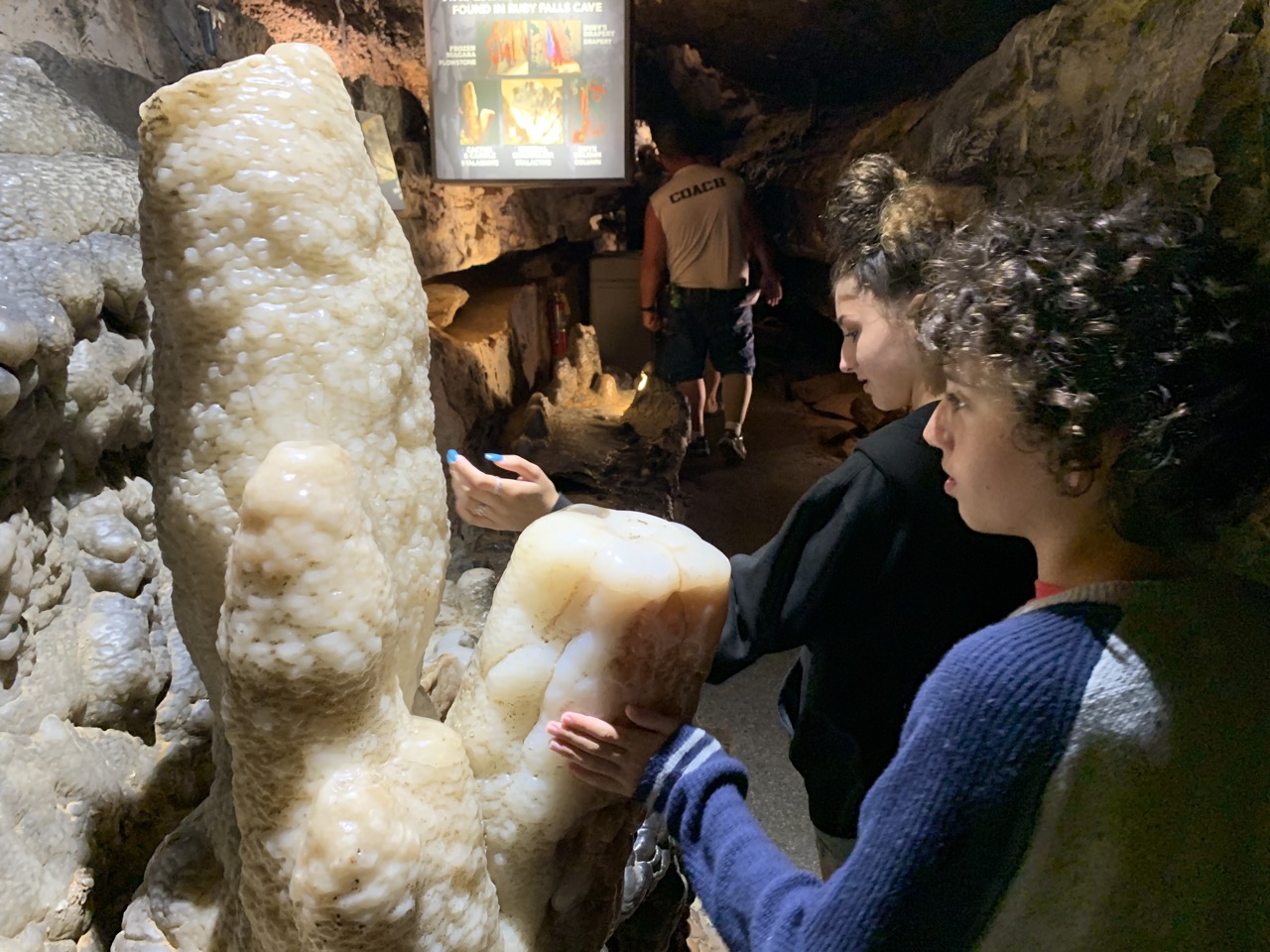 This formation has been set aside as the only one for people to touch, hoping that you will then not feel the urge to touch any others! (Our natural oils repel water and ruin the growth of delicate speleothems.)