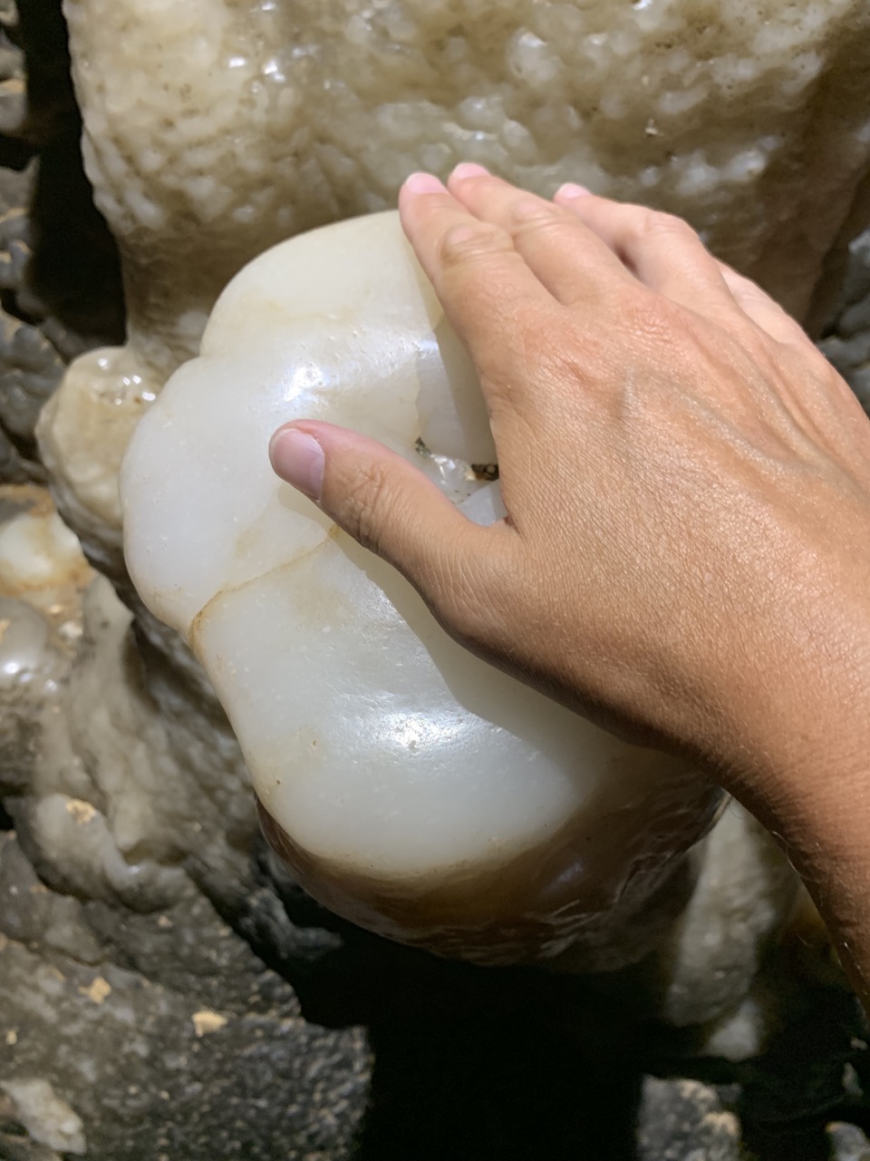 I touch the speleothem we're allowed to touch.